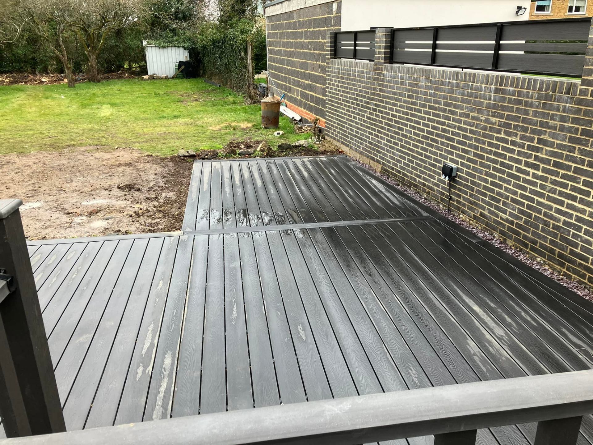 Composite decking installation in Devon garden