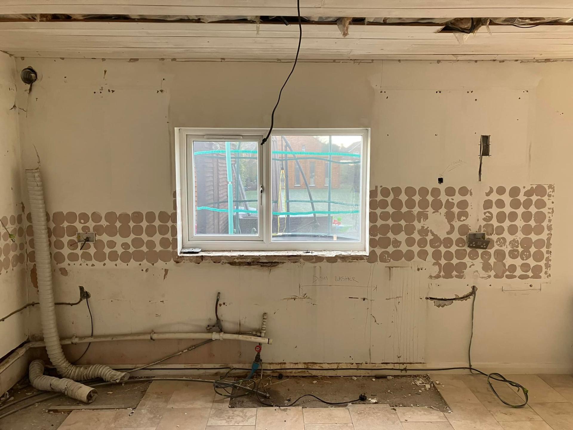 Kitchen stripped back to bare walls ready for refit